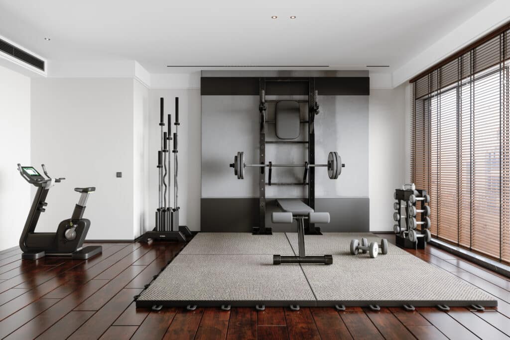 Personal Training Studio with Barbell, Dumbbells, Exercise Bike, Other Sports Equipment, and Heating and Air Solutions for Home Gyms